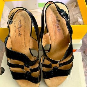 Womens patent leather wedge shoe sandal.